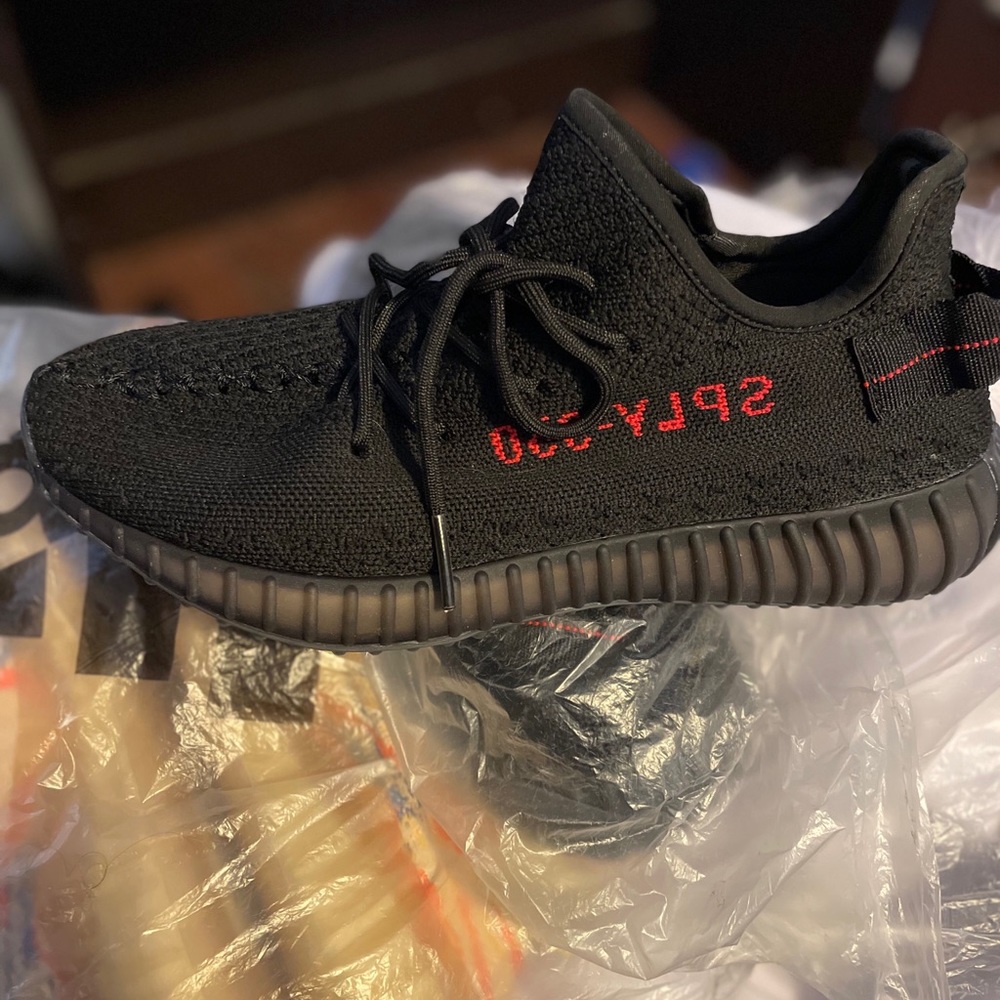 Brand new Yeezy size 8.5 and 10 black with red lettering